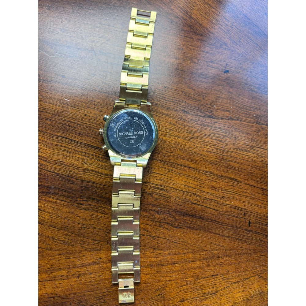 Michael Kors Ladies' Gold-Tone Stainless Steel Crystal-Accented Watch - Picture 4 of 7